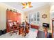 Office with Murphy bed, plantation shutters, nautical theme, and hardwood entertainment center at 7814 Sw 97Th Cir, Ocala, FL 34481
