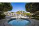 Community hot tub and pergola with seating and lush landscaping, ideal for relaxation at 8303 Sw 78Th Cir, Ocala, FL 34476