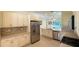 Bright kitchen with stainless steel appliances, lots of cabinets, and a stylish backsplash at 8303 Sw 78Th Cir, Ocala, FL 34476