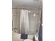 Bathroom with a tub-shower combination, ideal for relaxing and unwinding at 8450 Sw 90Th St # D, Ocala, FL 34481