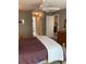 Bedroom with view into the en-suite bathroom, closet and neutral decor at 8450 Sw 90Th St # D, Ocala, FL 34481