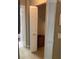 Hallway closet with bi-fold door and wire shelving at 8450 Sw 90Th St # D, Ocala, FL 34481