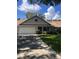 Charming single-story home with a well-manicured lawn and mature landscaping at 8450 Sw 90Th St # D, Ocala, FL 34481