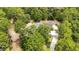Overhead view of home showing layout, accessory dwelling, and surrounding green space and privacy at 8605 Sw 209Th Court Rd, Dunnellon, FL 34431