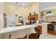 Spacious kitchen with modern appliances, breakfast bar, and ample counter space at 8605 Sw 209Th Court Rd, Dunnellon, FL 34431