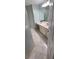 Bathroom featuring marble tile floor, white cabinets, and sink at 8771 Sw 115Th St, Ocala, FL 34481