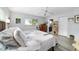 Well-lit bedroom with wood-look floors and a comfortable queen-sized bed at 8841 Sw 91St St # A, Ocala, FL 34481