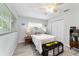 Inviting bedroom with wood-look floors and neutral decor at 8841 Sw 91St St # A, Ocala, FL 34481