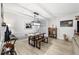 Dining area with a rustic table, bench seating, hardwood floors and unique decor at 8841 Sw 91St St # A, Ocala, FL 34481