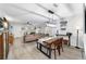 Open floor plan connecting the living and dining areas with hardwood floors, and plenty of natural light at 8841 Sw 91St St # A, Ocala, FL 34481