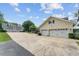 Three-car garage and additional garage provide ample parking and storage at 9095 Sw 9Th Ter, Ocala, FL 34476