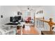 Comfortable living room with ceiling fan and hardwood floors at 9095 Sw 9Th Ter, Ocala, FL 34476
