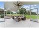 Screened in lanai with outdoor fireplace at 9095 Sw 9Th Ter, Ocala, FL 34476