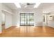 Living room with skylights and sliding doors that look out to the pool at 9180 Sw 202Nd Avenue Rd, Dunnellon, FL 34431