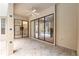 Spacious patio with large sliding glass doors offering seamless indoor-outdoor living and pool views at 9180 Sw 202Nd Avenue Rd, Dunnellon, FL 34431