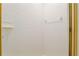 Bright shower featuring white tiled walls, a soap dish, and a towel bar for added convenience at 9180 Sw 202Nd Avenue Rd, Dunnellon, FL 34431
