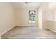 Light-filled bedroom featuring high ceilings and a decorative window at 9213 Sw 197Th Cir, Dunnellon, FL 34432