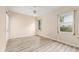 Open bedroom featuring plank floors, ceiling fan, and French doors at 9213 Sw 197Th Cir, Dunnellon, FL 34432