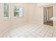 Bright dining area with tile floor and natural light overlooking the backyard and pool at 9213 Sw 197Th Cir, Dunnellon, FL 34432