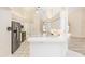 Bright kitchen features stainless appliances, white cabinetry, and a spacious breakfast bar at 9213 Sw 197Th Cir, Dunnellon, FL 34432