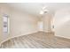 Spacious Main Bedroom features vinyl plank flooring, neutral paint, ceiling fan and lots of natural light at 9213 Sw 197Th Cir, Dunnellon, FL 34432