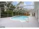 Relaxing pool and spa with screened enclosure, creating a private oasis, and nearby gazebo for outdoor living at 9213 Sw 197Th Cir, Dunnellon, FL 34432