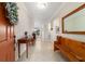 Inviting foyer featuring neutral tile floors and decoratively designed furniture at 9236 Sw 91St Court Rd, Ocala, FL 34481