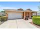Charming single-story home with a two car garage and manicured landscaping at 9236 Sw 91St Court Rd, Ocala, FL 34481