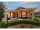 Inviting front porch with stone accents and colorful plants at 9236 Sw 91St Court Rd, Ocala, FL 34481