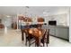 Bright living room with a modern kitchen, dining area and spacious layout, perfect for entertaining and Gathering gatherings at 9236 Sw 91St Court Rd, Ocala, FL 34481