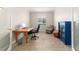Home office featuring wood floors, natural light, and ample space for a desk and seating at 9236 Sw 91St Court Rd, Ocala, FL 34481