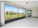 Screened lanai featuring backyard views, with access to the interior at 10032 Sw 85Th Place Rd, Ocala, FL 34481