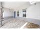 Covered porch with brick pavers, stone column accents, and a stylish exterior door for added charm at 10032 Sw 85Th Place Rd, Ocala, FL 34481