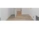 Utility room with wood-look floors and essential hookups at 10032 Sw 85Th Place Rd, Ocala, FL 34481