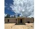 Spacious backyard with a covered porch, ready for landscaping at 10401 Se 125Th Ln, Belleview, FL 34420