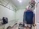 Walk-in closet with wire shelving and rod, providing ample storage space at 10459 Sw 62Nd Ct, Ocala, FL 34476