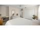 Bedroom with large closet, ceiling fan, desk, and decor at 12131 Ne 10Th Ter, Ocala, FL 34479