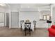 Dining area with a table and chairs next to the breakfast bar for casual and formal eating at 12320 Sw 62Nd Pl, Ocala, FL 34481