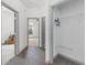 Hallway with tile floors that leads to two bedrooms and a closet for extra storage and easy access at 12320 Sw 62Nd Pl, Ocala, FL 34481