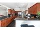 Kitchen featuring dark granite countertops, stainless steel appliances, and plenty of storage at 12320 Sw 62Nd Pl, Ocala, FL 34481