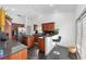 Spacious kitchen featuring granite countertops and stainless steel appliances at 12320 Sw 62Nd Pl, Ocala, FL 34481