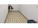 Additional storage space features unique patterned tile flooring at 12320 Sw 62Nd Pl, Ocala, FL 34481