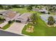 Aerial view features a well-manicured property, lush landscaping, and a welcoming curb appeal in a desirable neighborhood at 15549 Sw 11Th Terrace Rd, Ocala, FL 34473