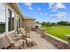 Charming patio with stone accents and comfortable seating, perfect for enjoying outdoor relaxation and scenic views at 15549 Sw 11Th Terrace Rd, Ocala, FL 34473