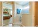 Bathroom with walk-in shower, access to bedroom, and tile floor at 16215 Sw 15Th Ct, Ocala, FL 34473