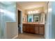 Bright bathroom with double sink vanity and walk-in shower at 16215 Sw 15Th Ct, Ocala, FL 34473
