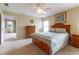 Spacious bedroom offers natural light, a ceiling fan, and ample closet space at 16215 Sw 15Th Ct, Ocala, FL 34473