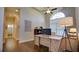 Bright office with an arched window, high ceilings, and a spacious work area at 17034 Florence View Dr, Montverde, FL 34756