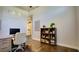 Inviting office with dark wood floors, neutral walls, and modern decor at 17034 Florence View Dr, Montverde, FL 34756