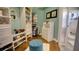 Walk-in closet with custom built-in shelves and hanging storage at 17034 Florence View Dr, Montverde, FL 34756